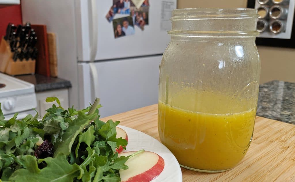 Salad with apples and salad dressing