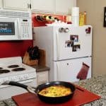 Frittata in pan in kitchen