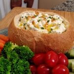 vegetable dip in a bread bowl
