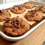 Gluten-Free Peanut Butter Chocolate Chunk Cookies on a cookie sheet