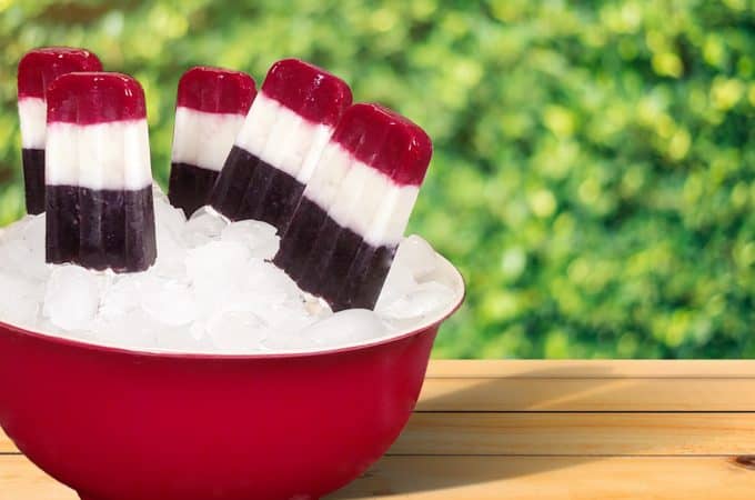 red, white and blue Popsicles in a red bowl