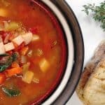 Mom's Vegetable Soup in a bowl, grilled bread, thyme
