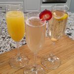 sparkling cocktails, morning mimosa, tiny kitchen bay berry fizz, champagne cocktail on bamboo cutting board