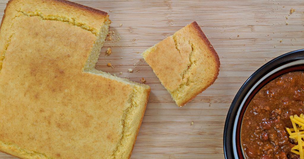 Slice of Cornbread with Bowl of Chili