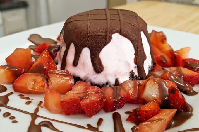 Mini Oreo Cookie Ice Cream Pie with Chocolate Shell Topping and Strawberries on a Plate