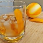 Old Fashioned Cocktail in Double Rocks Glass with Orange Zest