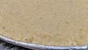 Close up of Keto Cauliflower Crust before cooking